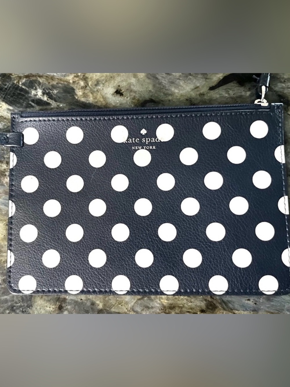 kate spade navy with white polka dot leather pouch